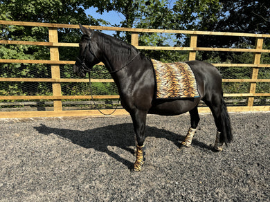 Tiger print saddle pads