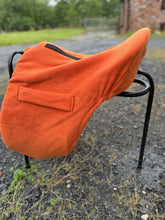 Load image into Gallery viewer, Embroidered storage saddle cover with girth tabs