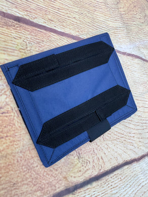 1 blue turnout rug buckle guards.
