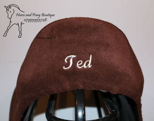 Embroidered saddle cover