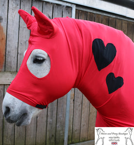 Red lycra horse hood with black hearts.