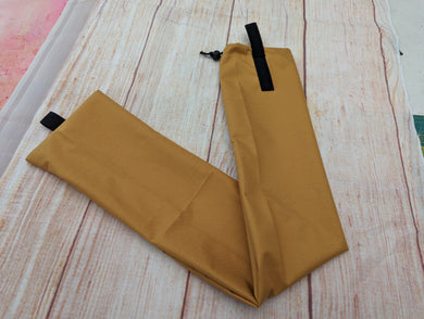 Waterproof mustard taul bag.