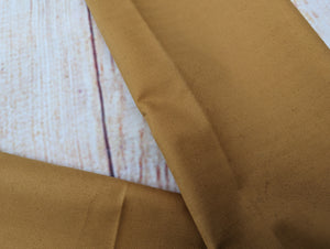 Waterproof mustard taul bag.